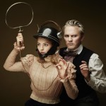 A girl with a helmet and a man standing behind her portray the characters from They Called Her Vivaldi.
