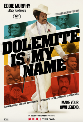 Eddie Murphy poses on the poster for Dolemite is My Name