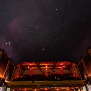 The Smith Opera House's ceiling painted to look like a cloudless night with tiny lights for stars