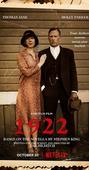 1922 poster. A man stands with his wife dressed in 1920's clothing